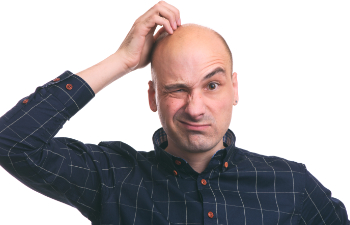 bald man scratching his head