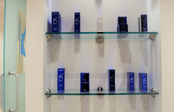 A display shelf with skincare products offered for sale at Kalos Hair Transplant, LLC in Atlanta GA.