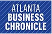 Logo of the Atlanta Business Chronicle with white text on a blue background featuring diagonal lines.